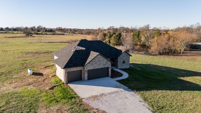 birds eye view of property featuring a rural view