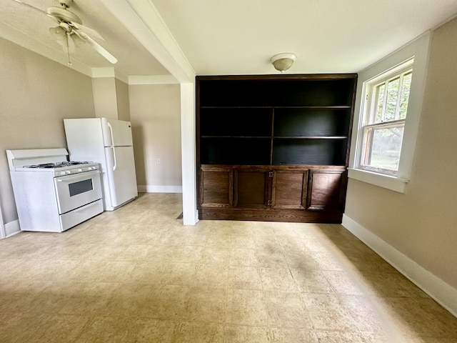kitchen with ceiling fan, baseboards, built in features, and white appliances