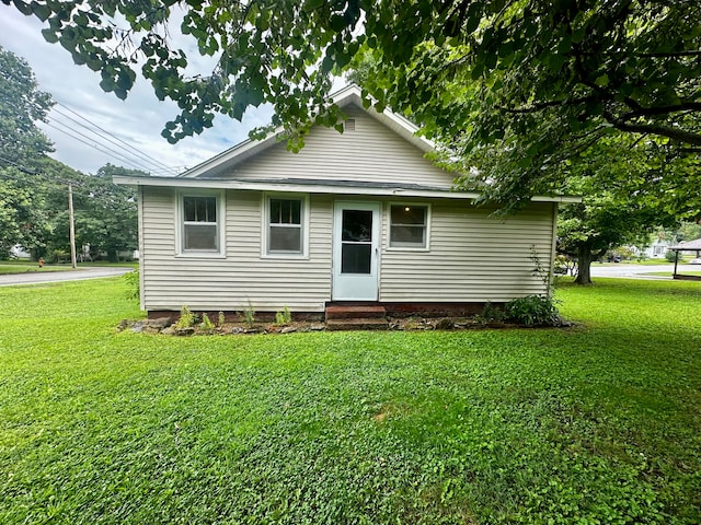 view of front of home with a front yard