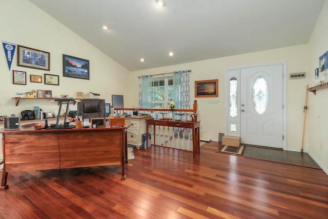 home office with dark hardwood / wood-style flooring, plenty of natural light, and lofted ceiling