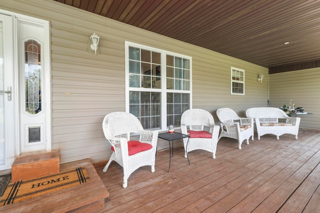 wooden deck featuring covered porch