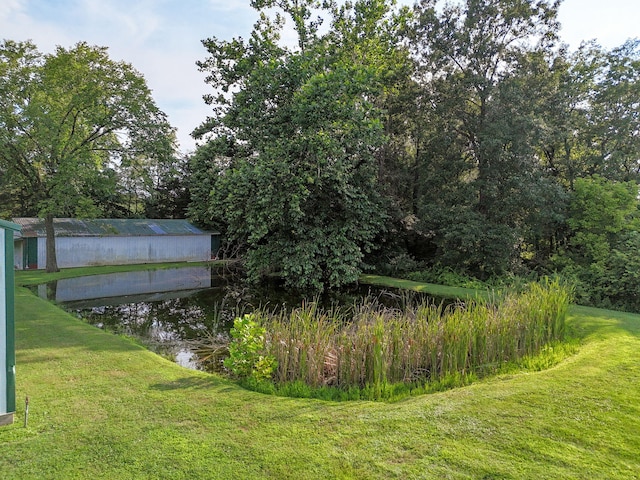 view of yard with a water view