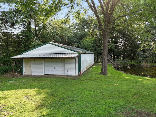 garage with a yard