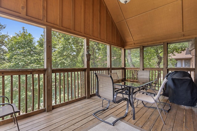 unfurnished sunroom with vaulted ceiling