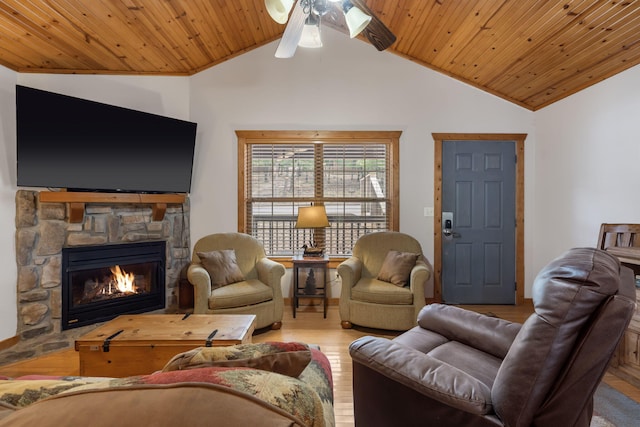 living room with lofted ceiling, light wood-type flooring, and wooden ceiling