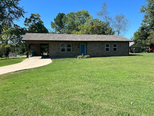 ranch-style house with a front lawn and a carport