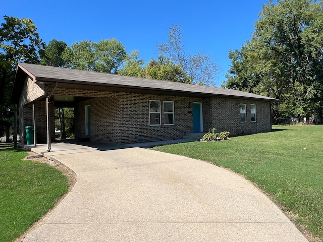 ranch-style house with a carport and a front yard