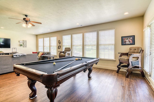 recreation room with pool table, hardwood / wood-style floors, and a wealth of natural light