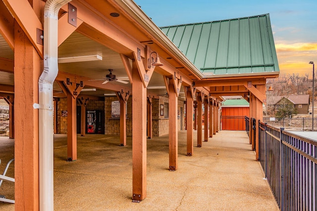 exterior space featuring ceiling fan