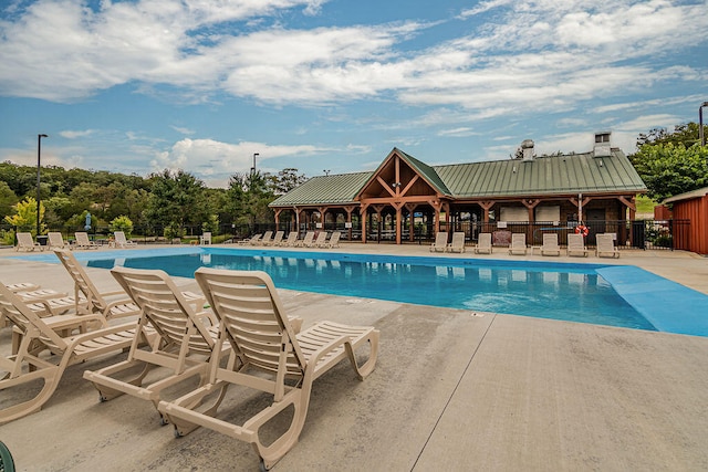 view of pool with a gazebo and a patio