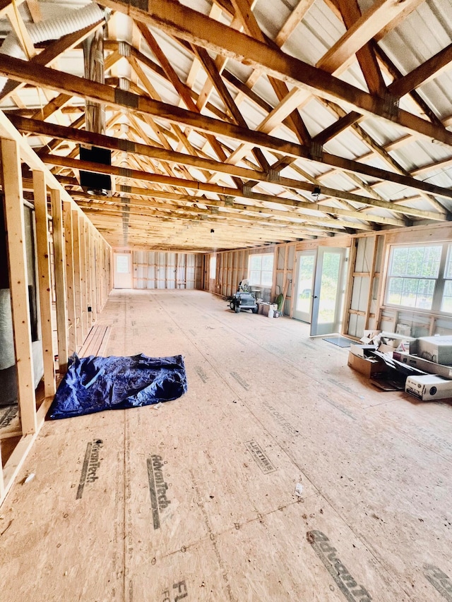 miscellaneous room featuring lofted ceiling