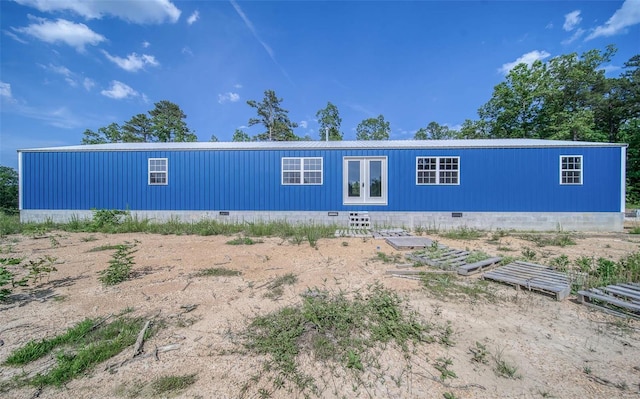 view of front of property with french doors and crawl space