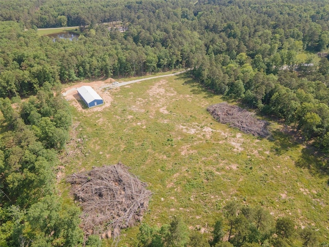 bird's eye view featuring a forest view