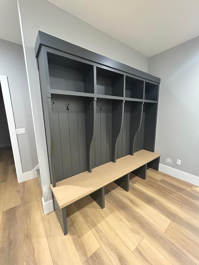 mudroom with hardwood / wood-style flooring