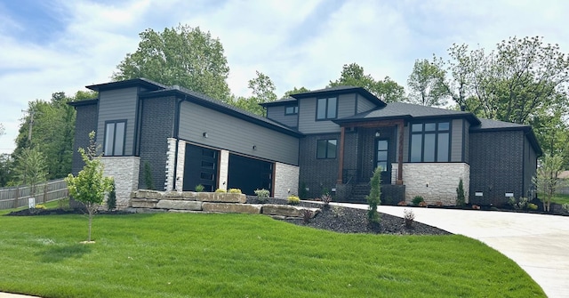 2978 E Kemmling Ln, Springfield, MO 65804 - view of front facade featuring stone siding and driveway
