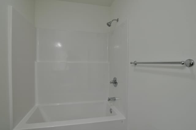 bathroom featuring washtub / shower combination