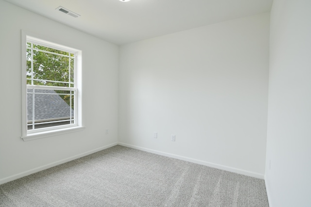 empty room with carpet floors