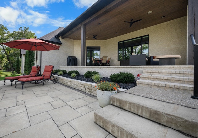 view of patio / terrace with ceiling fan