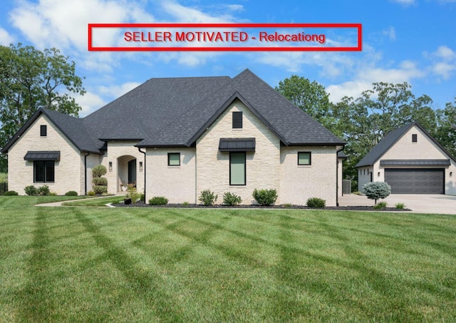 4254 S 94th Rd, Bolivar, MO 65613 - view of front of property with a front yard, roof with shingles, and a detached garage
