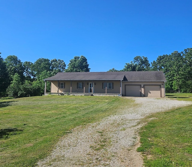 7186 US Highway 60, Mountain View, MO 65548 - ranch-style house featuring dirt driveway, an attached garage, a front yard, and a porch