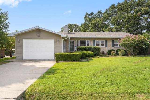 ranch-style home with a garage and a front yard