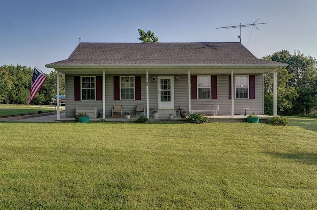 view of front of house with a front lawn and covered porch