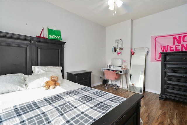 bedroom featuring ceiling fan and dark hardwood / wood-style floors