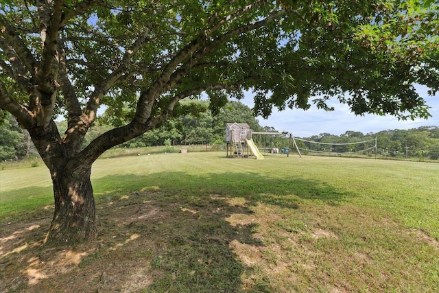 view of yard with a playground