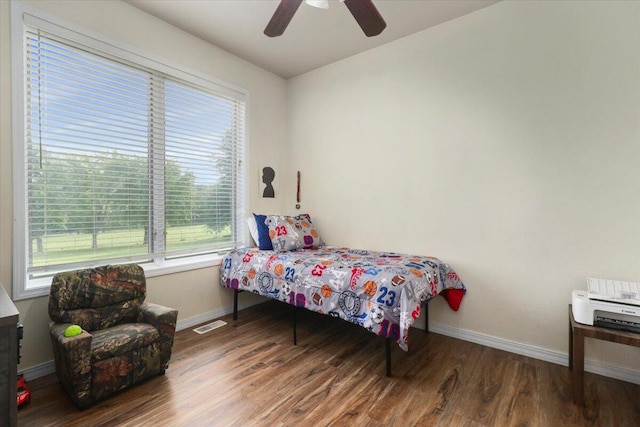 bedroom featuring ceiling fan and hardwood / wood-style floors