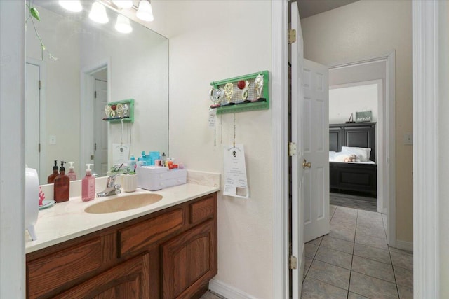 bathroom featuring tile patterned floors and vanity