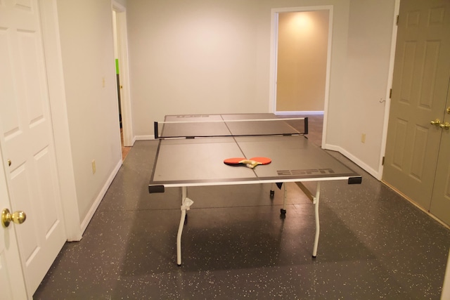 recreation room featuring baseboards
