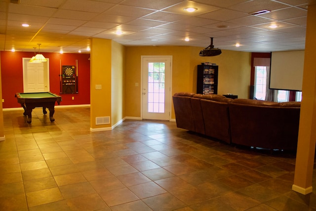 interior space with billiards, plenty of natural light, and a drop ceiling