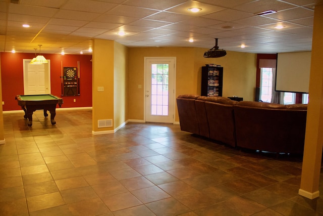 unfurnished living room featuring pool table, baseboards, tile patterned floors, and visible vents