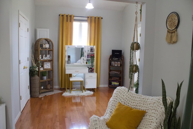 living area with wood-type flooring