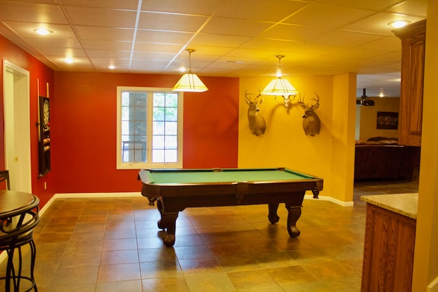 rec room with tile patterned floors, a paneled ceiling, and billiards