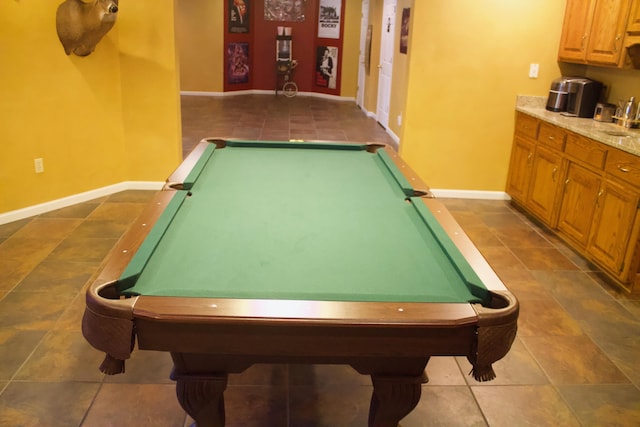 playroom with dark tile patterned floors, pool table, baseboards, and a sink