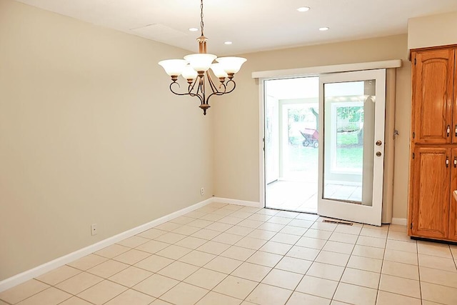 interior space with recessed lighting, baseboards, a notable chandelier, and light tile patterned floors