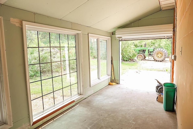 entryway featuring vaulted ceiling