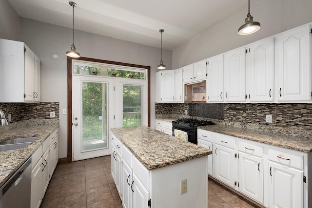 kitchen featuring white cabinetry, a kitchen island, sink, and black range with gas cooktop