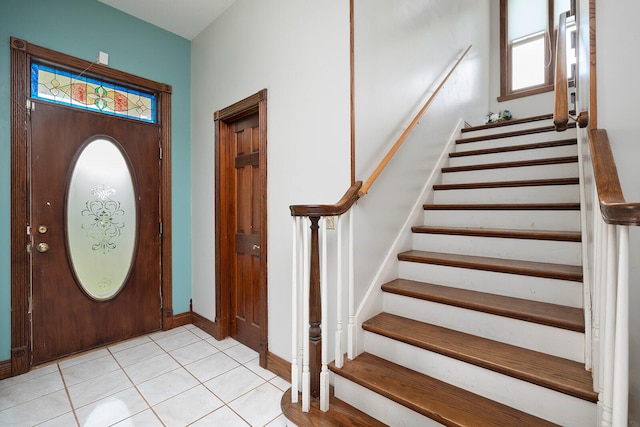 foyer with light tile patterned flooring