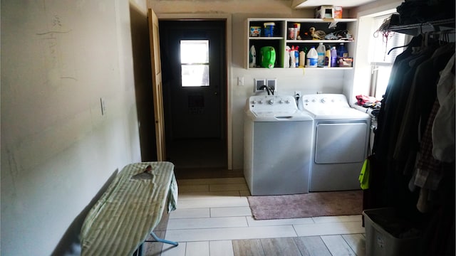 laundry area featuring washing machine and dryer