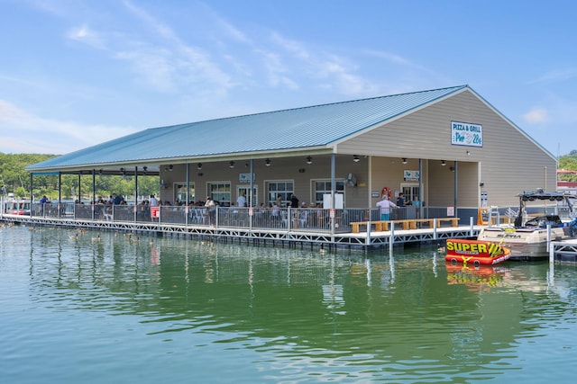 exterior space with a water view