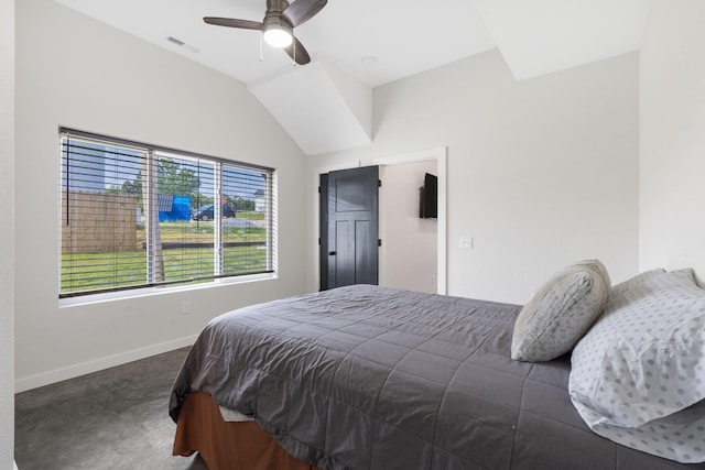 carpeted bedroom with visible vents, vaulted ceiling, baseboards, and ceiling fan