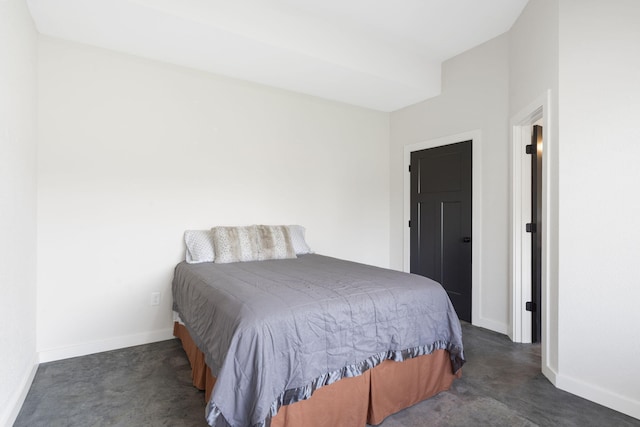 bedroom featuring baseboards