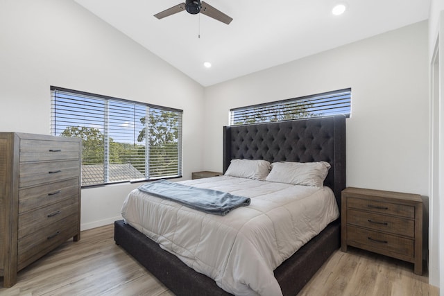 bedroom with vaulted ceiling, light wood-type flooring, a ceiling fan, and recessed lighting