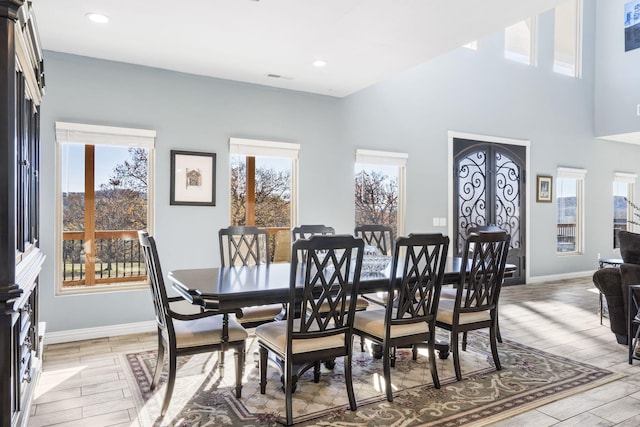 dining room with light hardwood / wood-style flooring