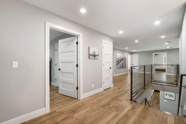 hallway featuring light hardwood / wood-style floors