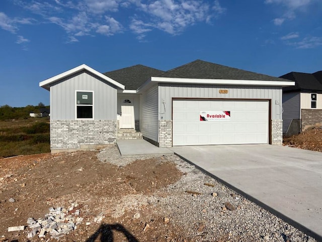 view of front of property with a garage