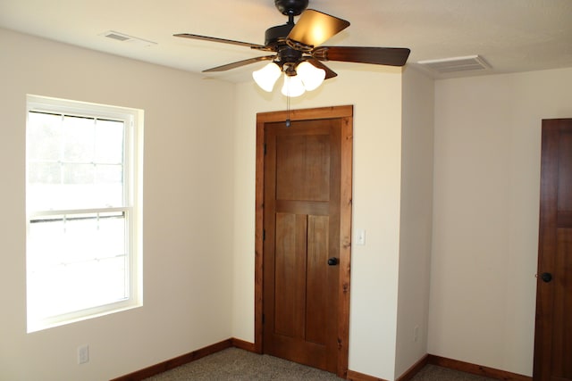 410 Park St, Taneyville, MO 65759 - unfurnished room featuring plenty of natural light, baseboards, and ceiling fan