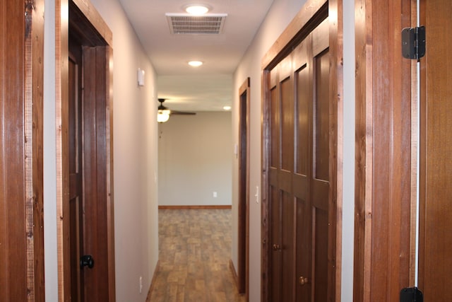 430 Park St, Taneyville, MO 65759 - corridor featuring wood finished floors, baseboards, and recessed lighting